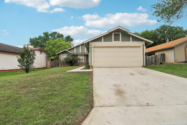 view of front of house featuring fence, a garage, concrete driveway, and a front yard