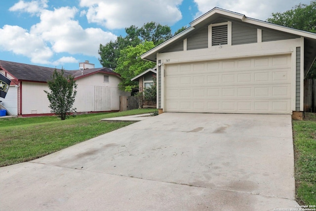 single story home with concrete driveway, a front lawn, and fence