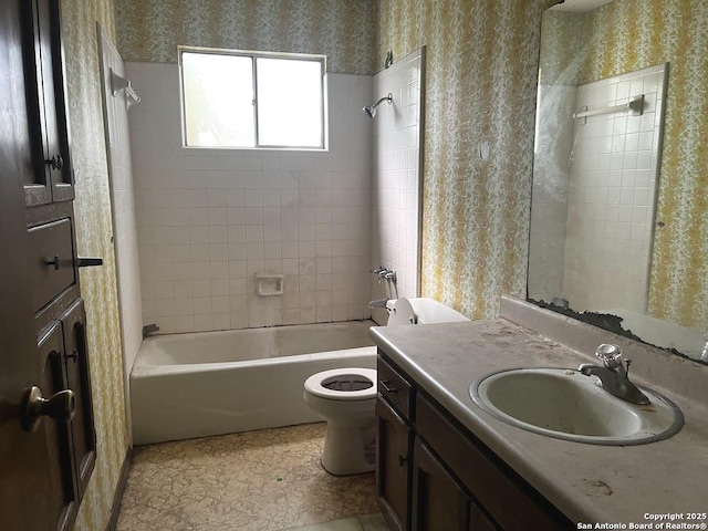 bathroom featuring wallpapered walls, shower / bath combo with shower curtain, toilet, and vanity