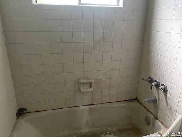 full bath with bathing tub / shower combination