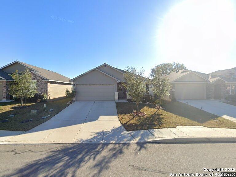5018 Shallow Divot, San Antonio, TX 78261 - single story home featuring concrete driveway and an attached garage