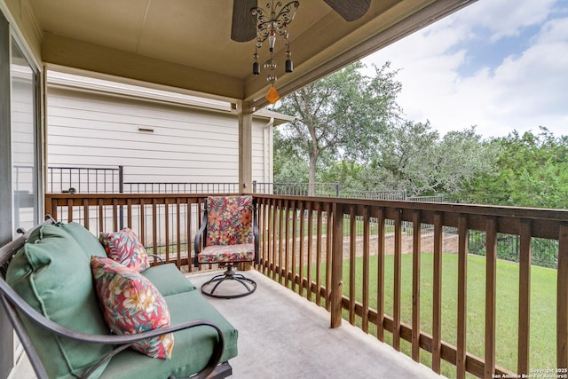 balcony featuring ceiling fan