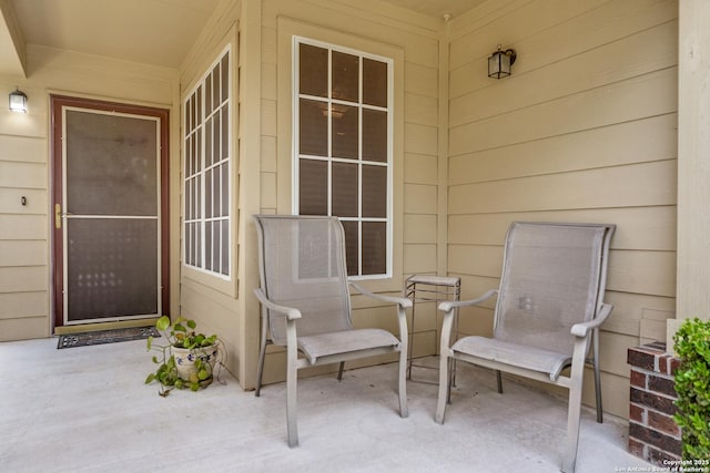 doorway to property with a patio