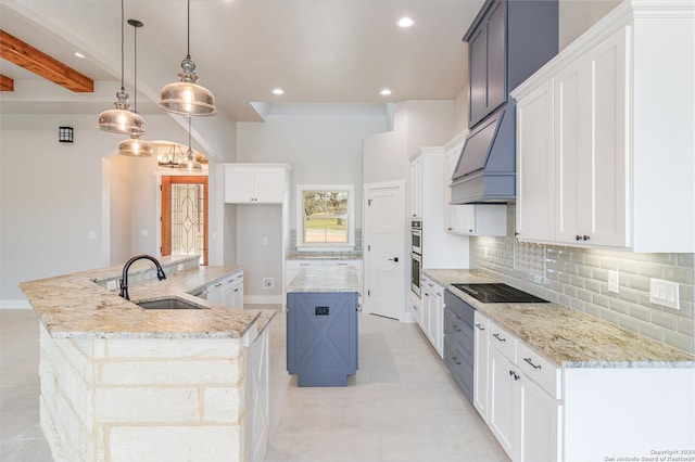 kitchen with a spacious island, a sink, custom range hood, backsplash, and black electric stovetop