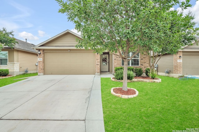 view of front of house featuring concrete driveway, a garage, a front lawn, and brick siding