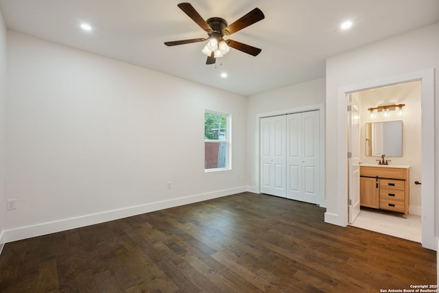 1030 Elsmere, San Antonio, TX 78201 - unfurnished bedroom featuring wood finished floors, a sink, a closet, baseboards, and recessed lighting