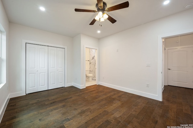 1030 Elsmere, San Antonio, TX 78201 - unfurnished bedroom with baseboards, dark wood-style flooring, and a closet