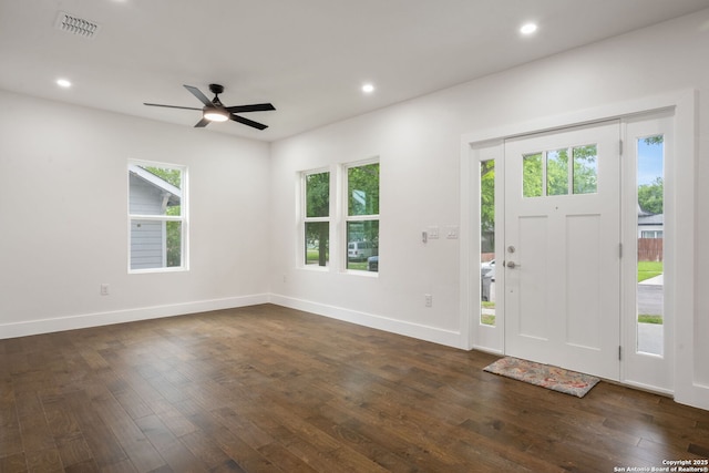 1030 Elsmere, San Antonio, TX 78201 - foyer entrance with baseboards, recessed lighting, dark wood finished floors, and visible vents