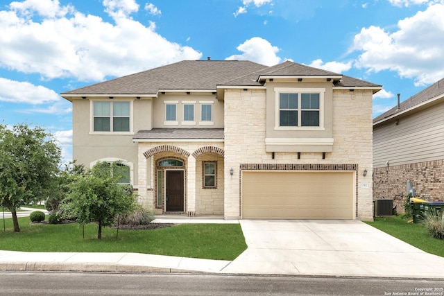 view of front of house featuring an attached garage, stone siding, stucco siding, concrete driveway, and a front lawn