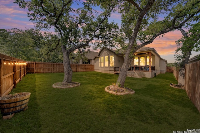 view of yard featuring a fenced backyard