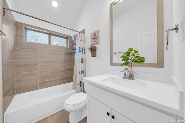 bathroom with shower / bath combo with shower curtain, toilet, and vanity