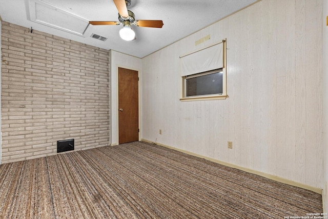 616 Ridgecrest, New Braunfels, TX 78130 - spare room with attic access, carpet floors, a ceiling fan, and visible vents