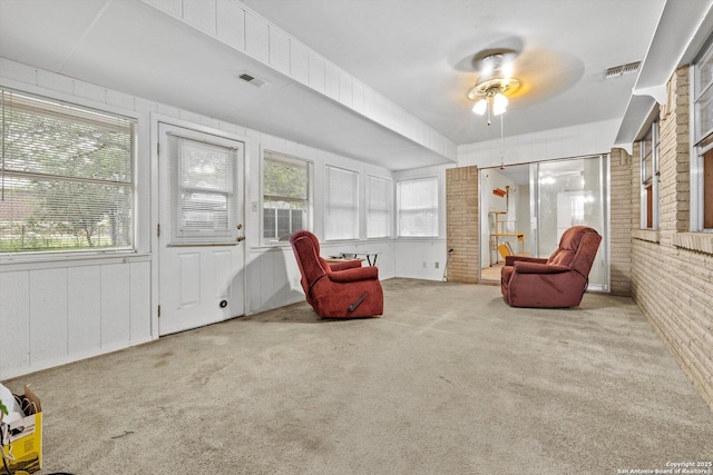 616 Ridgecrest, New Braunfels, TX 78130 - living area featuring carpet floors, a ceiling fan, and visible vents