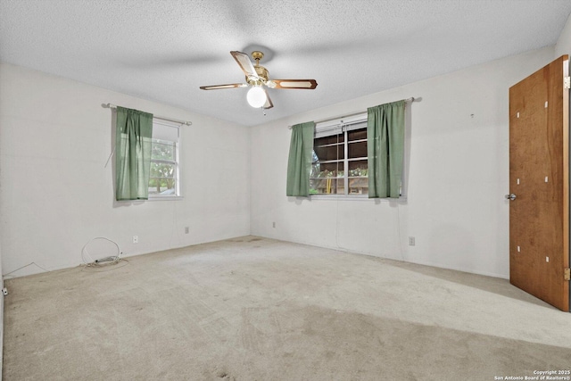 616 Ridgecrest, New Braunfels, TX 78130 - carpeted empty room with a textured ceiling and a ceiling fan