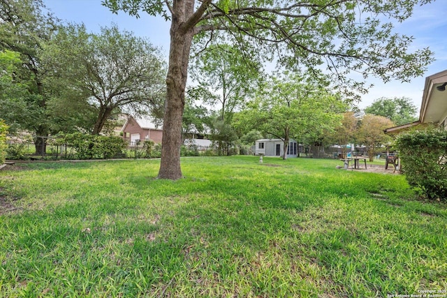 616 Ridgecrest, New Braunfels, TX 78130 - view of yard with fence, a storage shed, and an outdoor structure