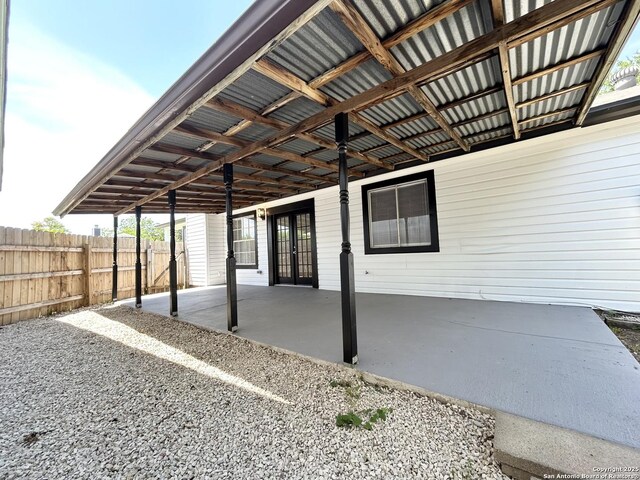 view of patio with fence and french doors