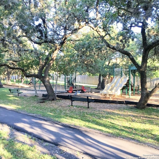 surrounding community with fence and playground community