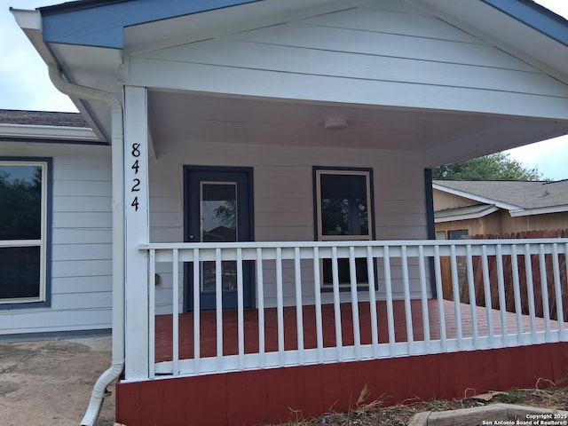 property entrance with a porch