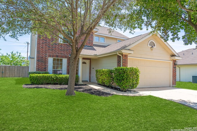 traditional home with a garage, fence, concrete driveway, a front yard, and roof with shingles