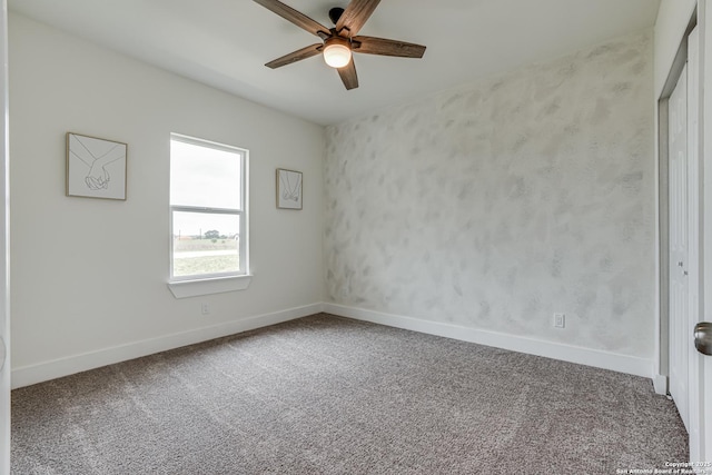 109 Hidden Hls, Floresville, TX 78114 - carpeted spare room with baseboards and a ceiling fan