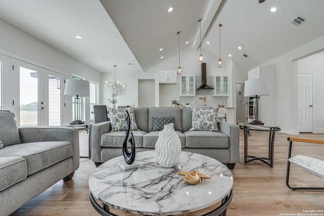 109 Hidden Hls, Floresville, TX 78114 - living area with an inviting chandelier, light wood-type flooring, visible vents, beamed ceiling, and recessed lighting