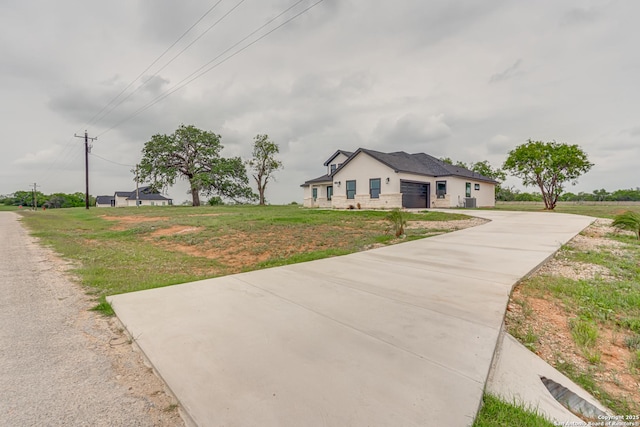 109 Hidden Hls, Floresville, TX 78114 - single story home featuring a front lawn, concrete driveway, and a garage