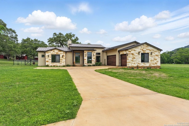 821 Bingham Ln, New Braunfels, TX 78132 - view of front of property with stone siding, driveway, a front yard, a chimney, and a standing seam roof