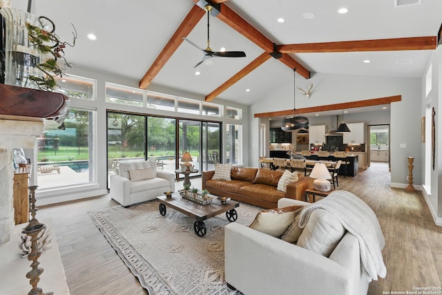 821 Bingham Ln, New Braunfels, TX 78132 - living room featuring recessed lighting, light wood finished floors, and beam ceiling