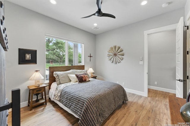 821 Bingham Ln, New Braunfels, TX 78132 - bedroom with light wood-type flooring, recessed lighting, and visible vents