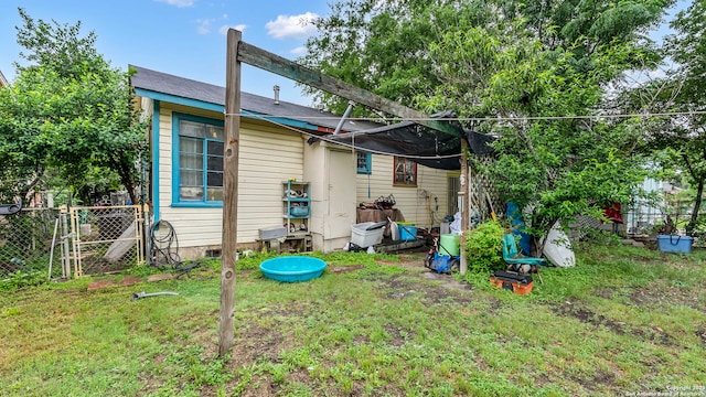 237 Delmar, San Antonio, TX 78210 - rear view of house with a yard and fence
