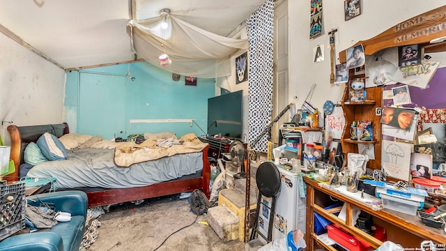 237 Delmar, San Antonio, TX 78210 - bedroom featuring unfinished concrete floors
