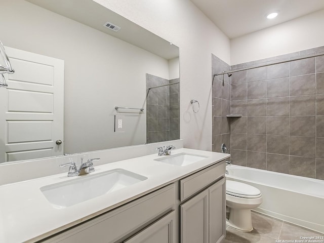 4532 Appaloosa Crst, San Antonio, TX 78245 - full bathroom featuring toilet, tile patterned flooring, visible vents, and a sink