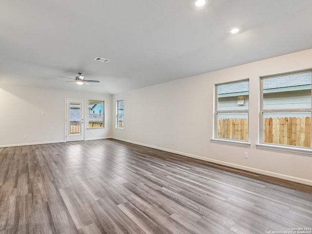 4532 Appaloosa Crst, San Antonio, TX 78245 - empty room with baseboards, ceiling fan, visible vents, and wood finished floors