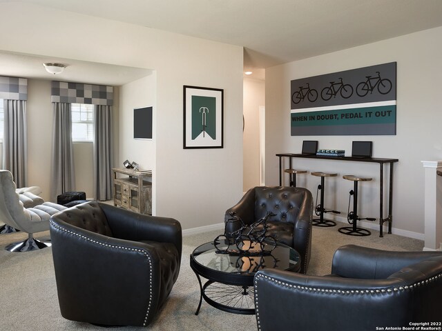 4539 Appaloosa Crst, San Antonio, TX 78245 - carpeted living room featuring baseboards