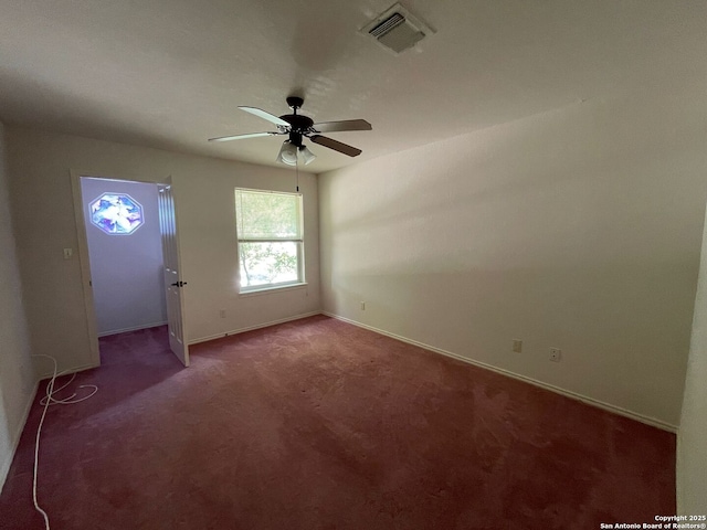 458 Vicksburg, Kerrville, TX 78028 - carpeted empty room with baseboards, ceiling fan, and visible vents