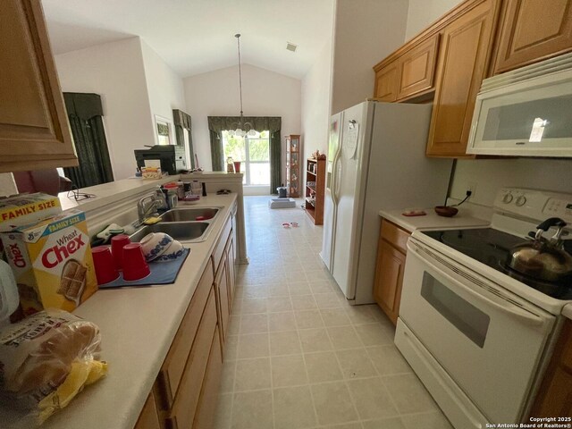 458 Vicksburg, Kerrville, TX 78028 - kitchen with light countertops, vaulted ceiling, a sink, and white appliances