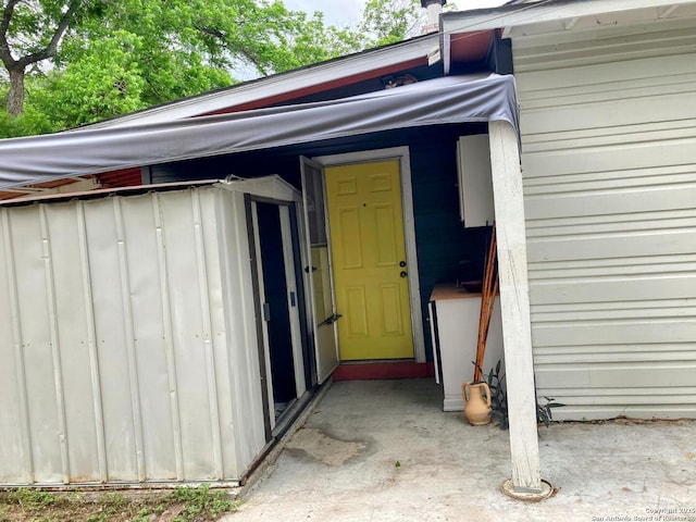 724 Holmgreen, San Antonio, TX 78220 - view of exterior entry featuring board and batten siding