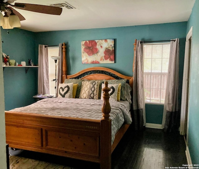 724 Holmgreen, San Antonio, TX 78220 - bedroom featuring visible vents, a ceiling fan, and hardwood / wood-style floors