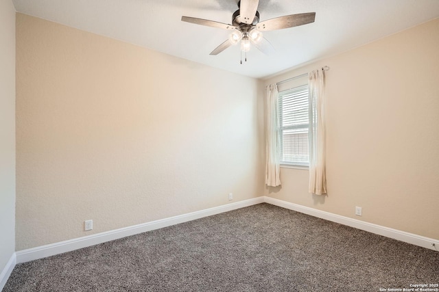 2253 Sun Stone, New Braunfels, TX 78130 - spare room featuring a ceiling fan, dark carpet, and baseboards