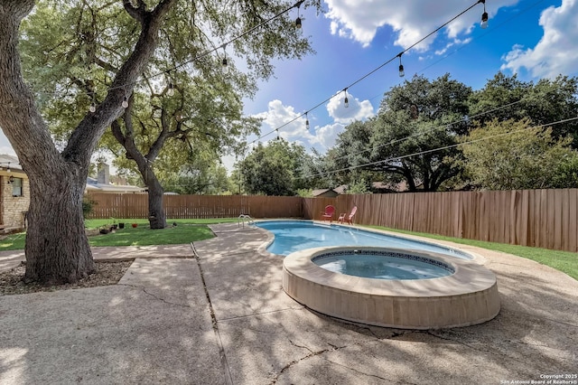 view of swimming pool featuring an in-ground hot tub, a fenced backyard, and a patio area