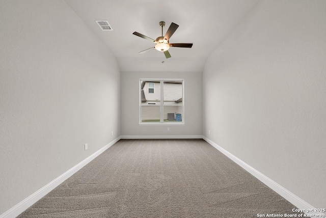 5303 Pinder Way, Schertz, TX 78108 - carpeted spare room with a ceiling fan, baseboards, visible vents, and vaulted ceiling