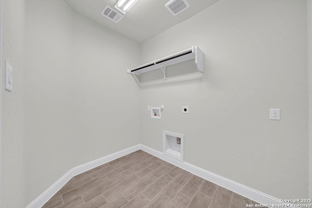 5303 Pinder Way, Schertz, TX 78108 - laundry room with laundry area, hookup for an electric dryer, baseboards, and visible vents