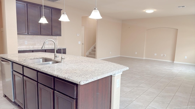 8411 Puente, San Antonio, TX 78223 - kitchen featuring decorative light fixtures, dishwasher, visible vents, and a sink
