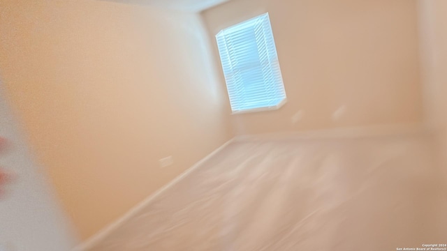 8411 Puente, San Antonio, TX 78223 - unfurnished room featuring baseboards and carpet floors