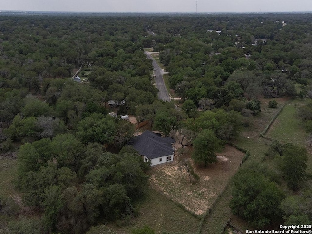 aerial view featuring a forest view