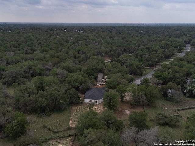 bird's eye view featuring a view of trees