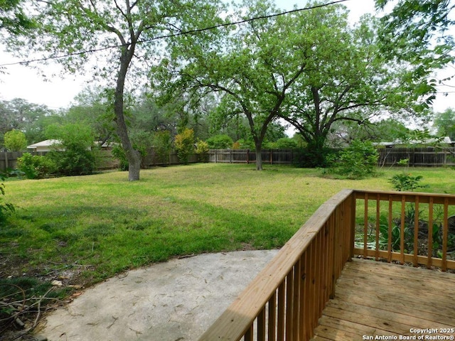 911 Austin, Sabinal, TX 78881 - view of yard with a fenced backyard and a deck