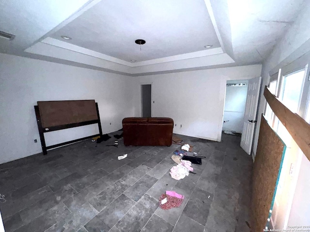 2424 S Victoria, Donna, TX 78537 - unfurnished living room featuring a raised ceiling