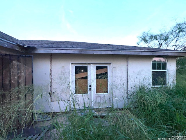 2424 S Victoria, Donna, TX 78537 - view of side of property with roof with shingles and stucco siding