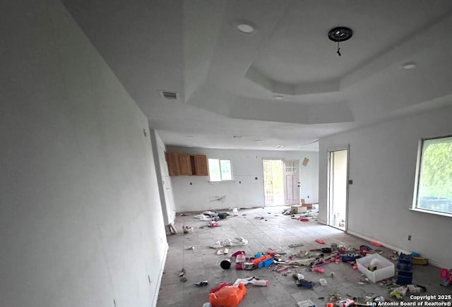 2424 S Victoria, Donna, TX 78537 - unfurnished living room with a raised ceiling